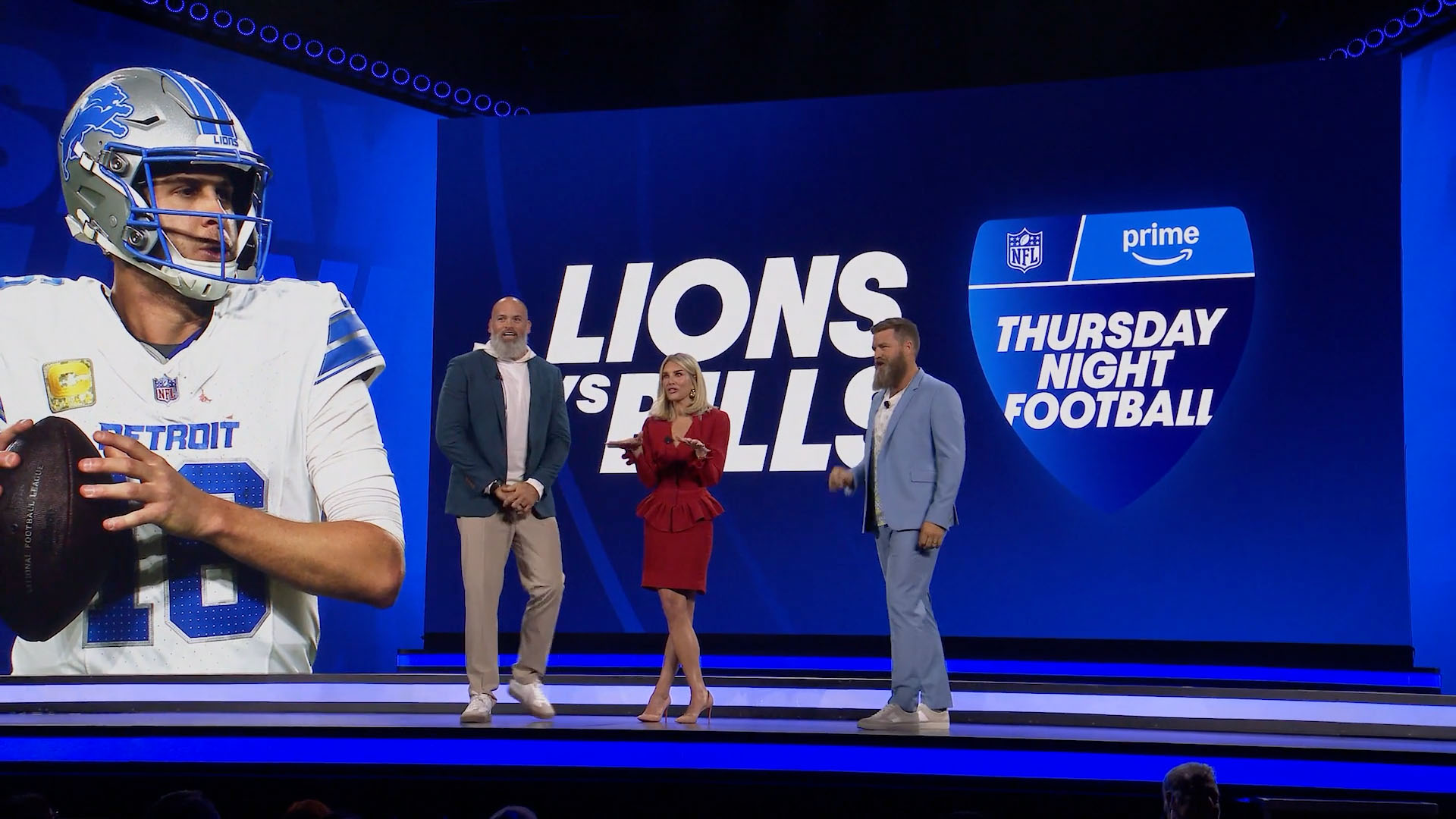 Three presenters beneath Detroit Lions and Prime Thursday Night Football graphics.